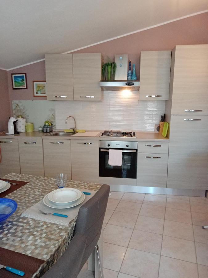 Casa Vacanza Le 2 Isole Suni Exteriör bild